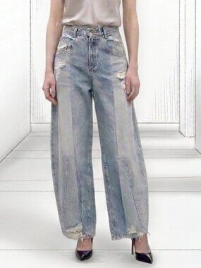 Upcycled horseshoe two tone jeans.